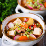 Korean beef doenjang jjigae stew with vegetables and tofu.