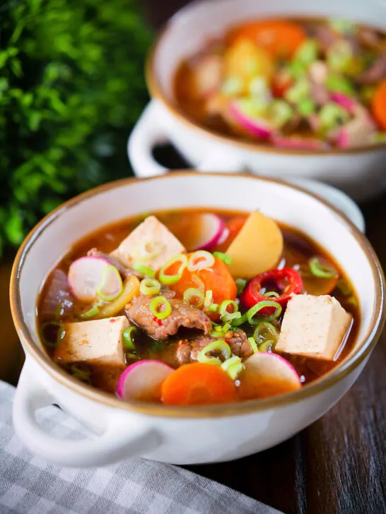 Korean beef doenjang jjigae stew with vegetables and tofu.