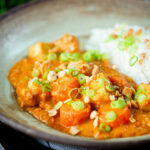 Domoda a West African stew, vegan version with sweet potato and carrot, served with rice.