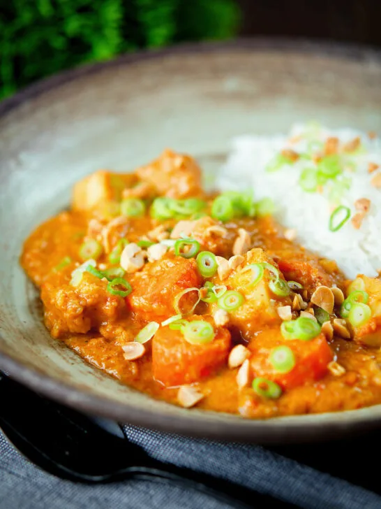 Domoda a West African stew, vegan version with sweet potato and carrot, served with rice.