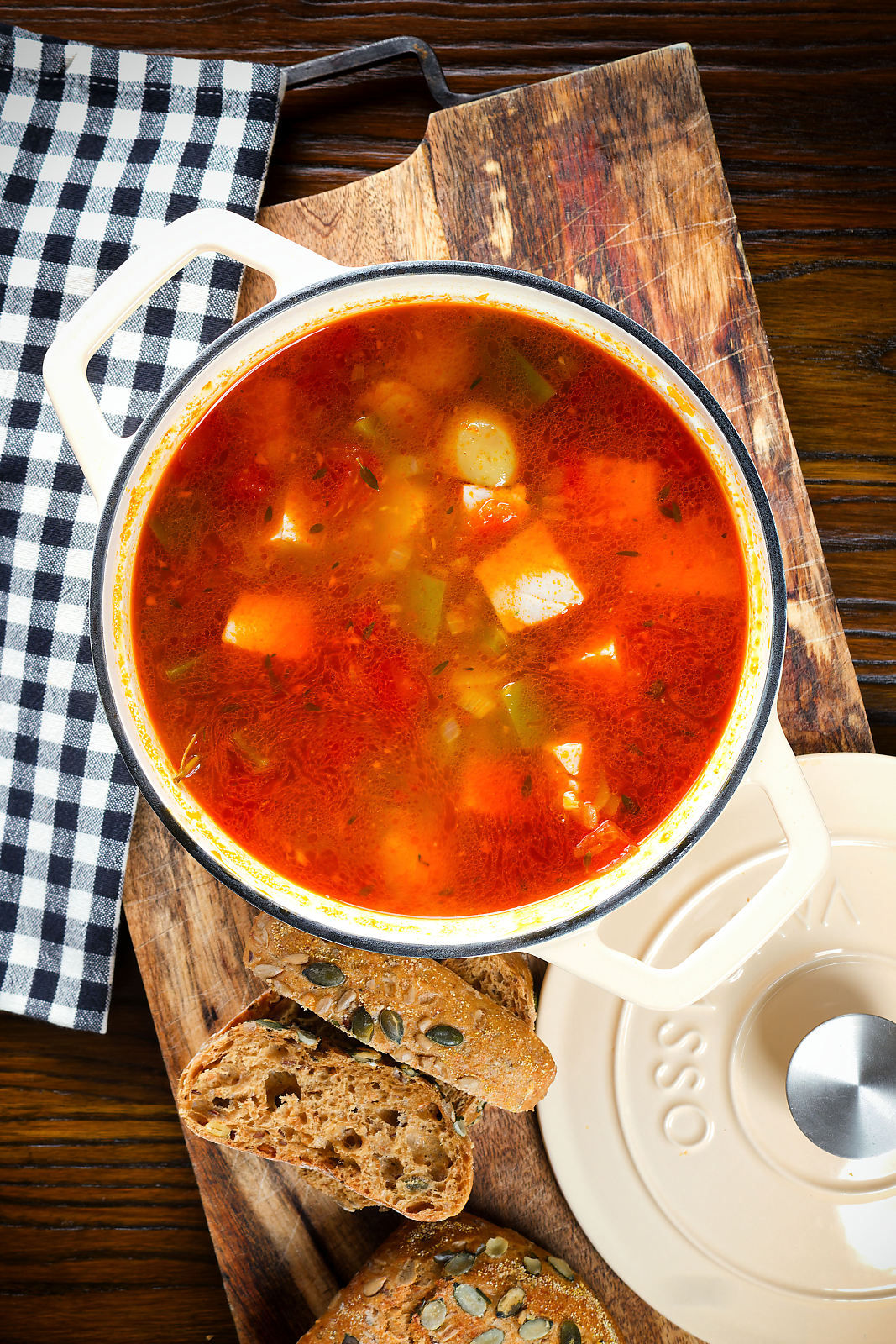 Marmitako, Basque tuna stew with potatoes, peppers and smoked paprika in its cooking pot.