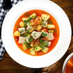 Overhead Marmitako, Basque tuna stew with potatoes, peppers and smoked paprika.
