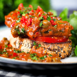 Tinned sardines on toast with capers, fresh tomato and chilli served with watercress.