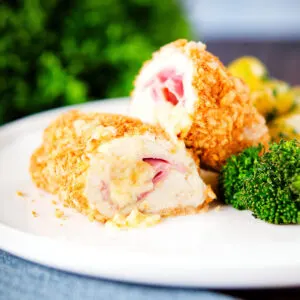 Air fryer chicken cordon bleu (ham and cheese), with buttered potatoes and tenderstem broccoli.