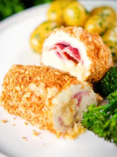 Air fryer chicken cordon bleu with buttered potatoes and broccoli.