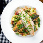 Overhead mackerel fillets with horseradish, leek, potato and samphire hash.