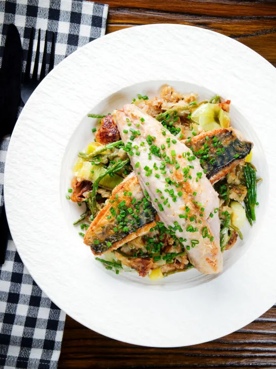 Overhead mackerel fillets with horseradish, leek, potato and samphire hash.