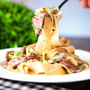 Creamy steak and mushroom pasta with a "Diane" sauce and snipped chives.