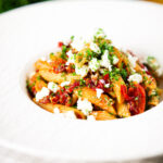 Rose harissa, sun-dried tomato, pepper and feta cheese pasta.