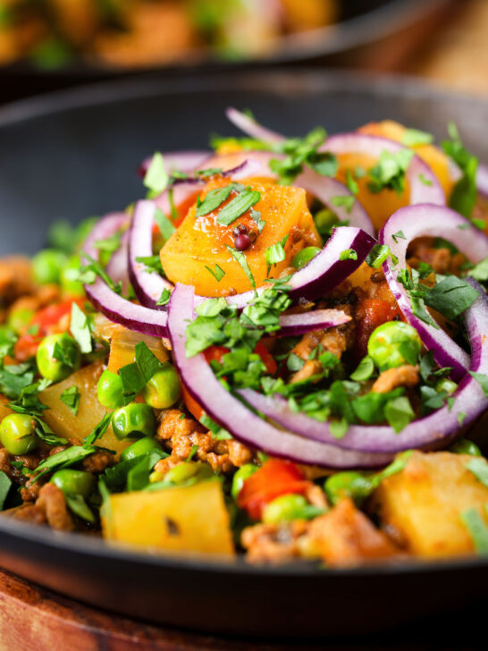 Close-up minced beef, potato and pea curry (aloo keema matar).