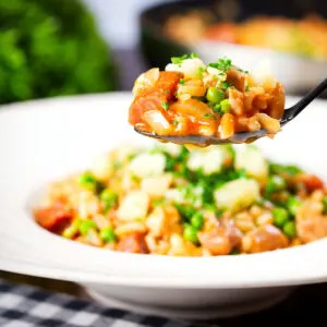 Chicken and chorizo risotto with peas and Manchego Cheese.