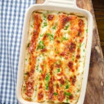 Baked crab, fennel and cottage cheese cannelloni with a parmesan crust.