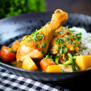 Vietnamese chicken curry (ca ri ga) served with jasmine rice and fresh coriander.