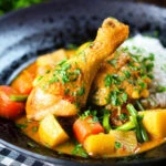 Vietnamese yellow chicken curry (ca ri ga) served with jasmine rice.