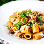 Pork mince pasta with balsamic vinegar, sun-dried tomatoes and sage.
