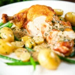 Chicken with Veronique sauce (grapes, vermouth and tarragon), new potatoes and fine beans.