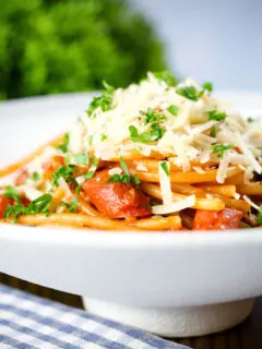 Filipino (Jollibee) sweet spaghetti with hot dog sausages, minced pork and cheddar cheese.