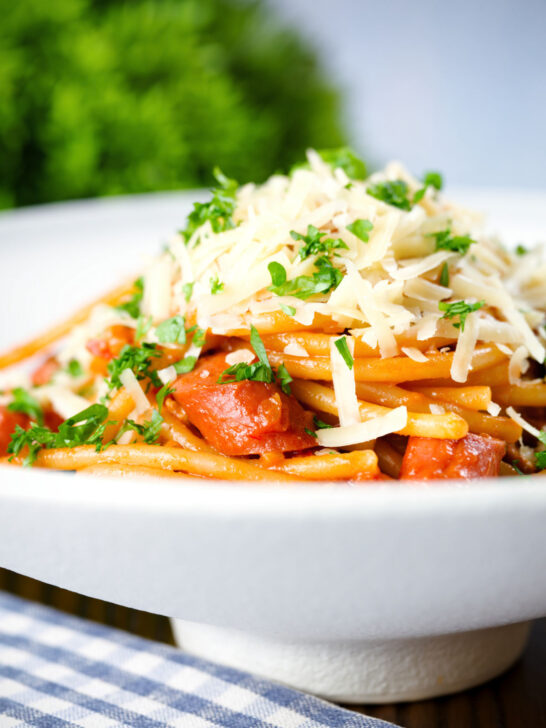 Filipino (Jollibee) sweet spaghetti with hot dog sausages, minced pork and cheddar cheese.