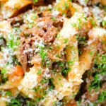 Close-up overhead pasta alla Genovese: beef and onion ragu with ziti.