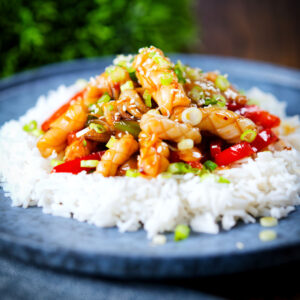 Spicy squid and pepper stir fry in oyster sauce and Lao Gan Ma served with white rice.