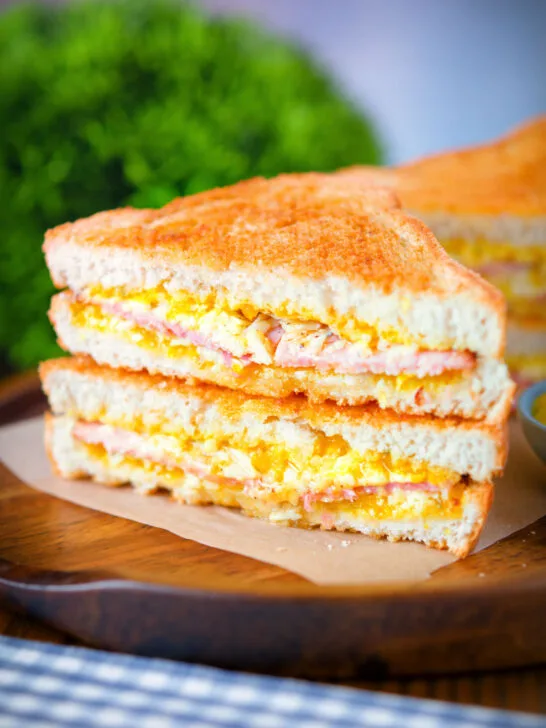 Crispy air fryer cooked ham and cheese toastie with piccalilli.