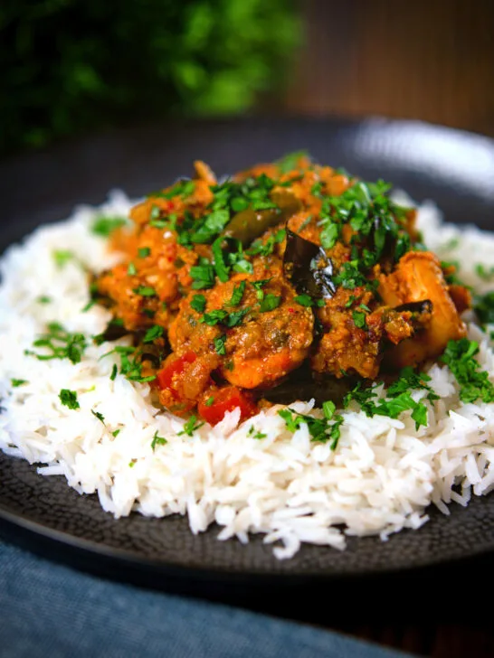 Andhra style chicken curry (kodi kura) served with Basmati rice.