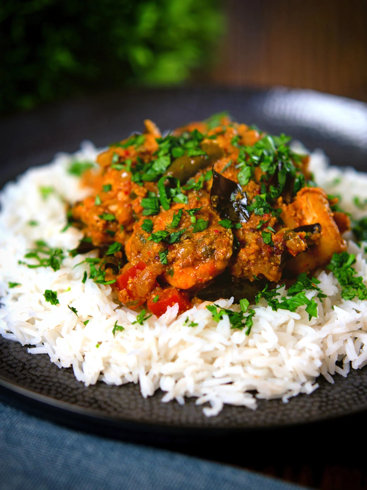 Andhra style chicken curry (kodi kura) served with Basmati rice.