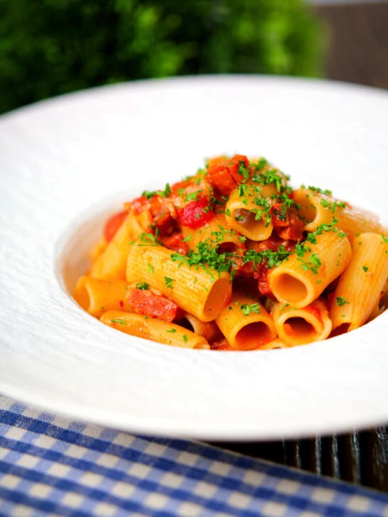Chorizo sausage and bacon pasta in a tomato sauce.