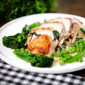 Roasted chicken Florentine with a creamy spinach and oyster mushroom sauce.