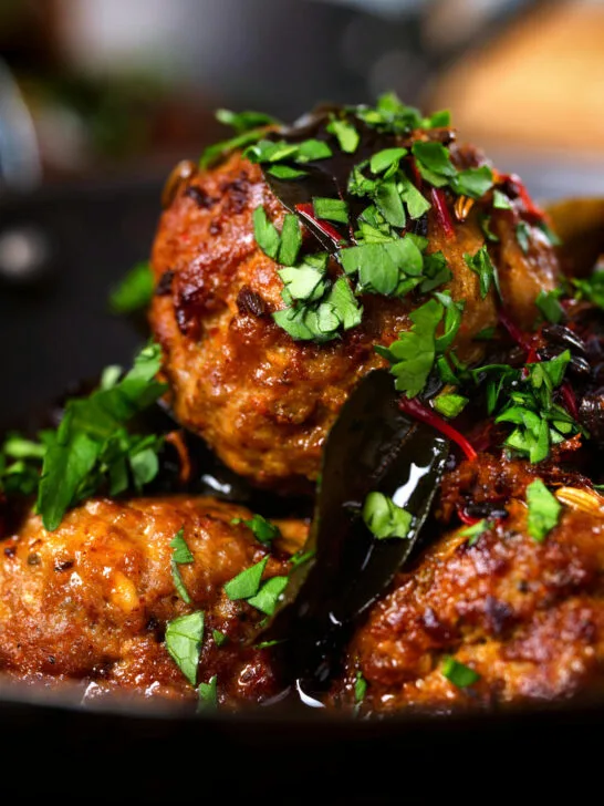 Close-up Kashmiri meatball curry, Lamb rista in a spicy saffron gravy.
