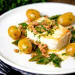 Roasted halibut with a potted shrimp and vermouth sauce, new potatoes and runner beans.
