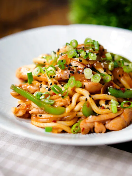Garlic chicken udon noodles stir fry with crispy chilli oil.