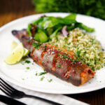 Harissa baked/roasted rainbow trout with herbed bulgur wheat.