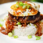 Hawaiian loco moco: beef patty, white rice, Worcestershire sauce gravy and a fried egg.