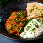 Indian-influenced canned tuna curry served with rice and chapatis.