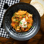 Hungarian székelykáposzta: pork belly and sauerkraut stew served with sour cream.