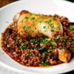 Chicken leg and pearl barley stew with red wine and prunes.