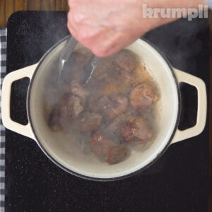 Lamb Stew with Dumplings Process shot 1 of 7