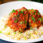 Baked Thai red curry chicken thighs served with egg fried rice.