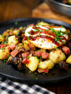 Ham, black pudding and potato hash served with a fried egg.