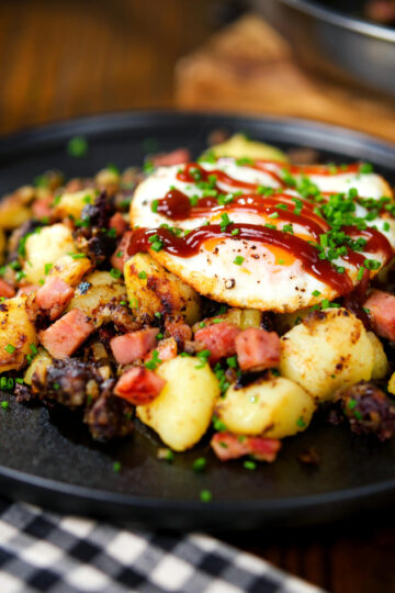 Ham, black pudding and potato hash served with a fried egg.