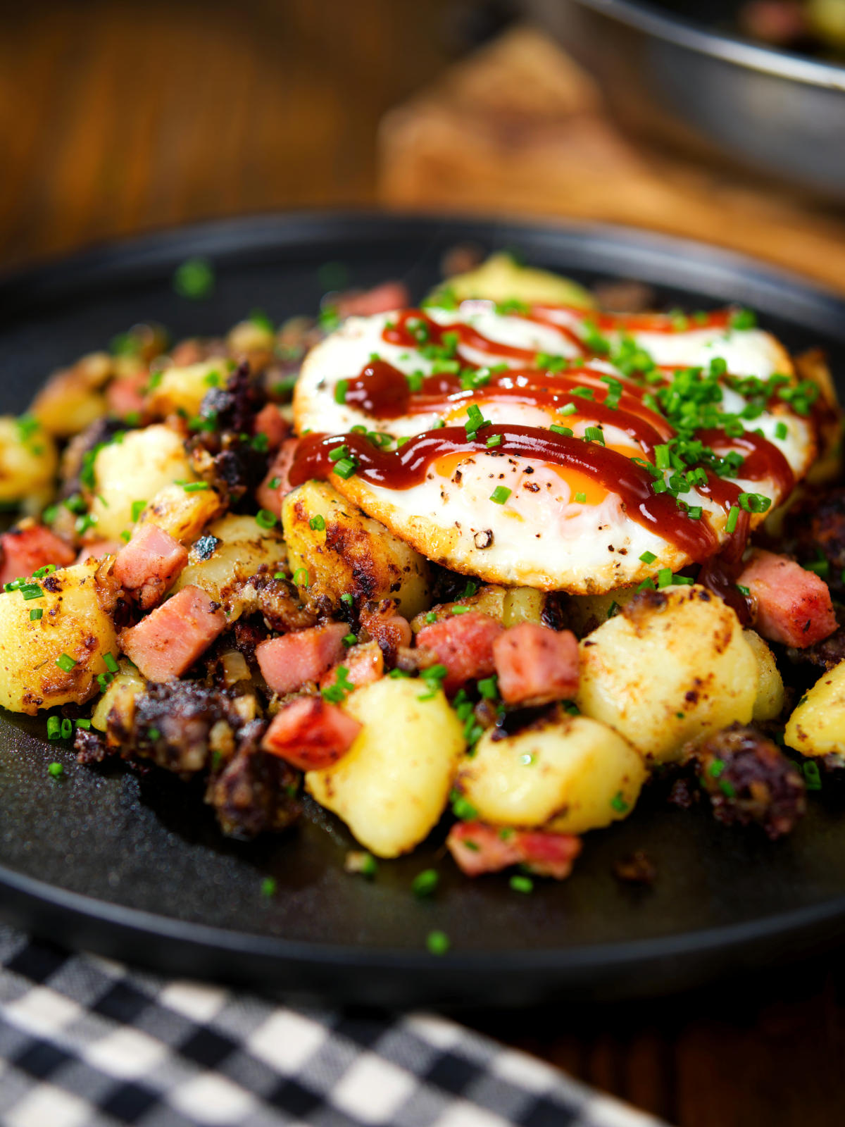 Ham, black pudding and potato hash served with a fried egg.