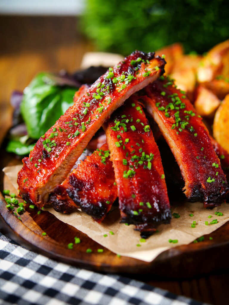 Korean gochujang glazed pork ribs served with potato wedges.