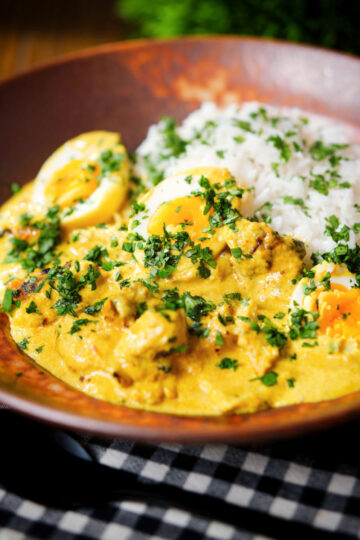 Kuku paka: African chicken curry with boiled eggs served with white rice.