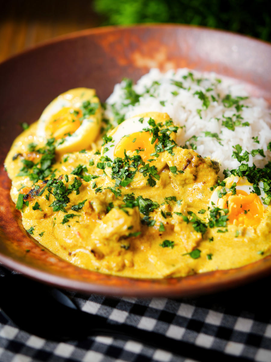 Kuku paka: African chicken curry with boiled eggs served with white rice.