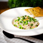 Smoked mackerel risotto with peas, dill and chilli, serve with garlic bread.