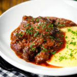 Spezzatino di manzo an Italian beef, wine and tomato stew served with polenta.