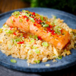 Salmon fillet baked in sweet chilli sauce served with egg fried rice.