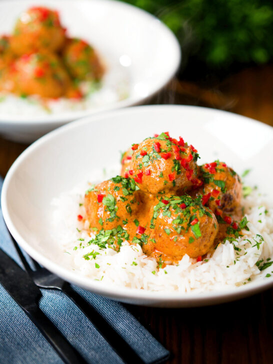Thai red curry chicken meatballs served with white rice.