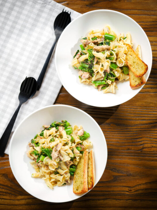 Overhead tinned mackerel, tenderstem broccoli pasta served with garlic bread.